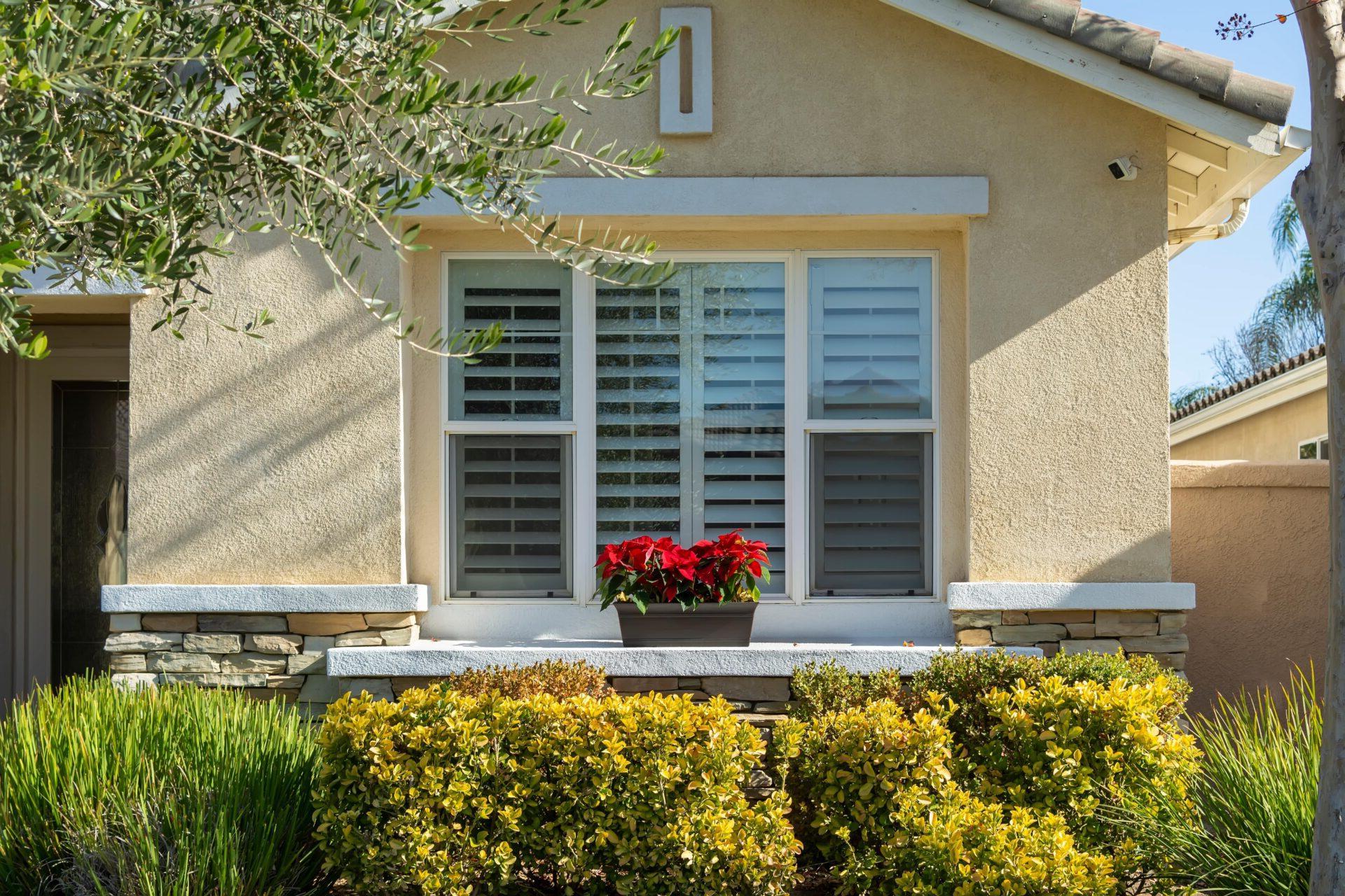 The back window of a home from the outside